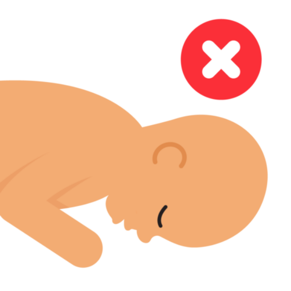 Illustration depicting baby laying on their front in an unsafe sleeping position. The illustration shows that their airway, ability to breathe, is blocked. Marked with a cross.