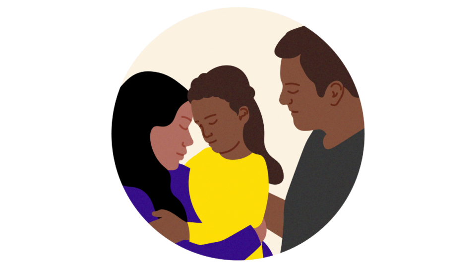 Child with two adults either side. The child is resting her head on the lady's head.