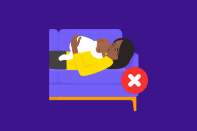 Mother lying on the sofa with her baby sleeping upon her chest with a purple background. A red cross indicates this is not a recommended sleeping position.