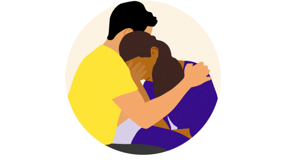 Lady resting her head on someone's shoulder as he supports her, with her hand covering her eyes.