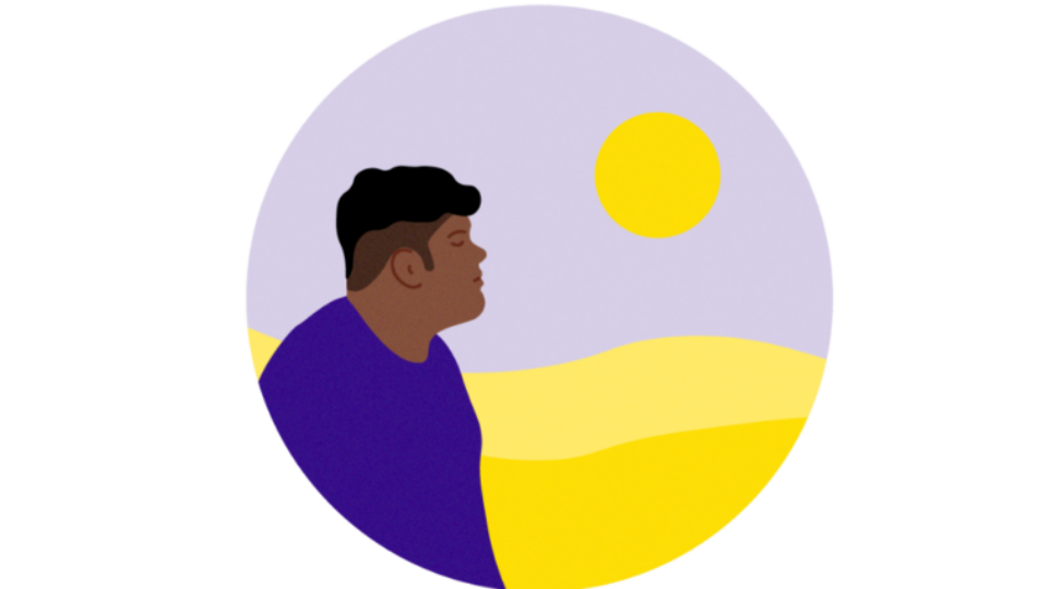 Hopeful man outdoors looking out at the sun in a vast landscape.