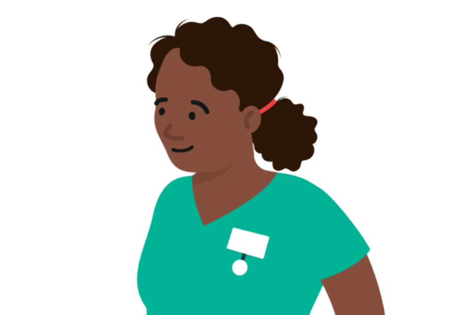 Smiling health professional wearing scrubs.