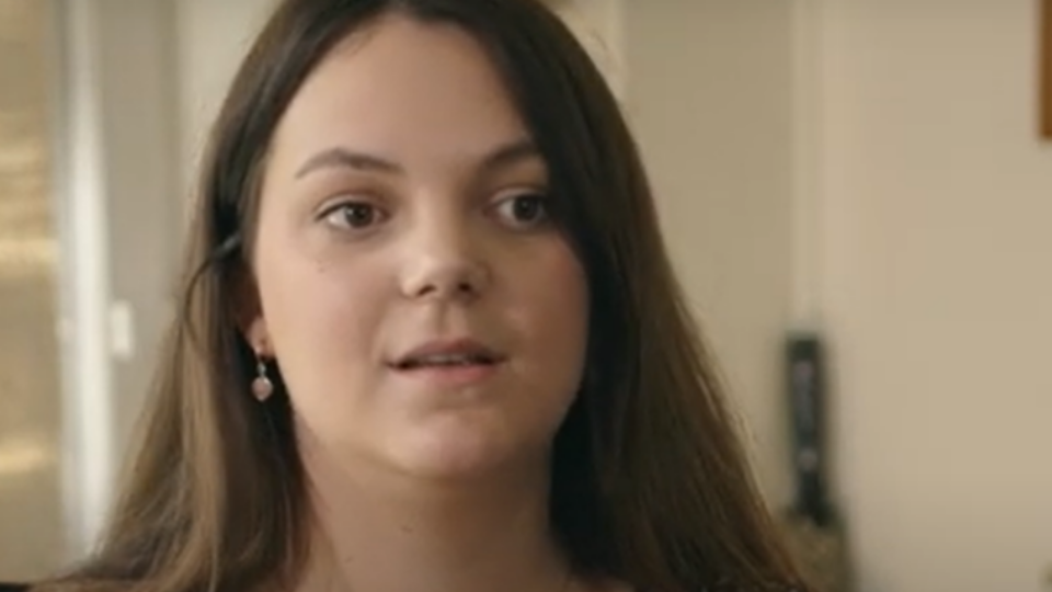 Lady speaking to camera about working with young parents.