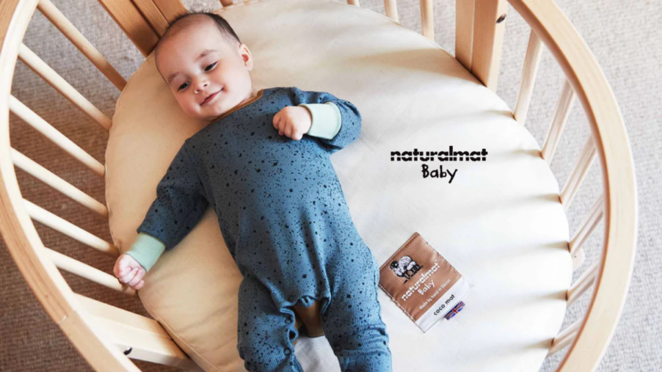 Baby lying in a crib