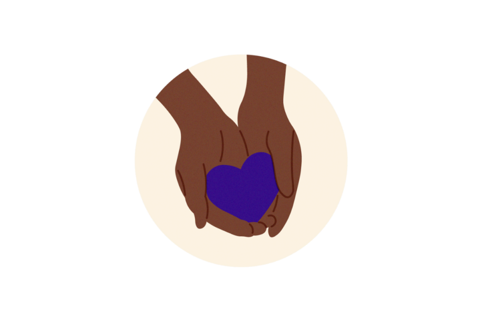 Hands holding purple heart, on a cream background.