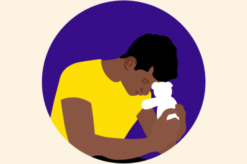 A graphic where a man is holding a teddy bear close to his forehead and looking down.