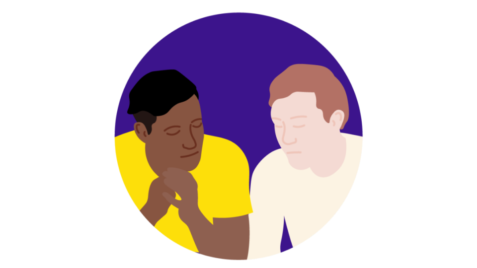 Two people sitting beside each other in support, in front of a purple circle.