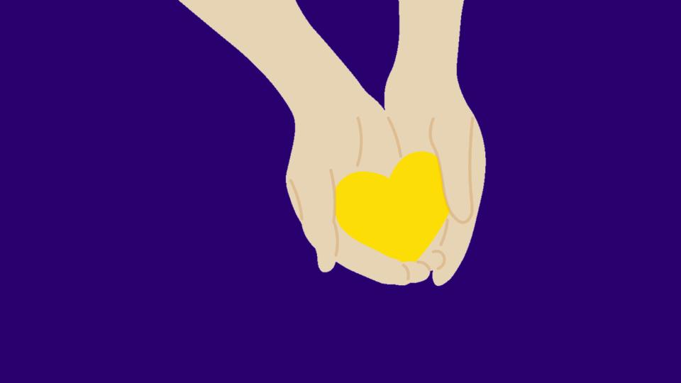 Hands holding yellow heart on purple background.