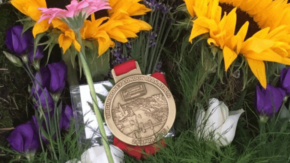 Clare's medal on Harry's memorial tree.