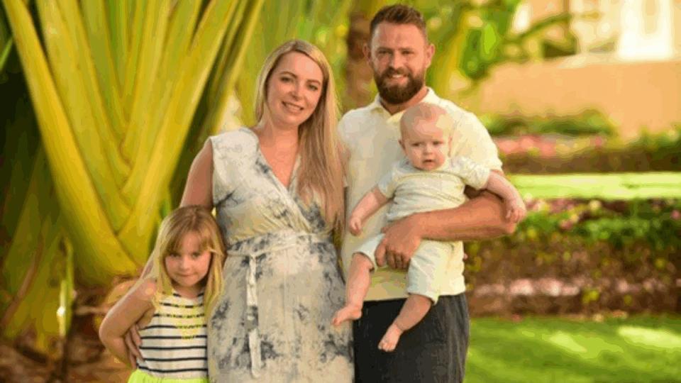 Family photo of Katie with her husband Christian, and their children Ellis and Theia.