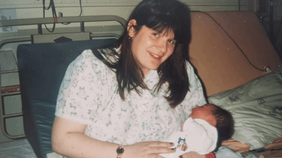 Christine with her daughter, Nerice, sitting up in bed.