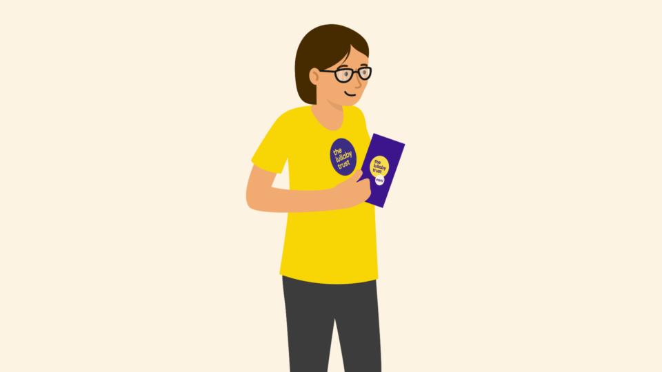 Lady wearing a Lullaby Trust t-shirt, holding a clipboard.