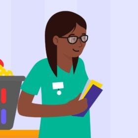 Health professional holding leaflets, standing next to a cot next to a man and a lady.