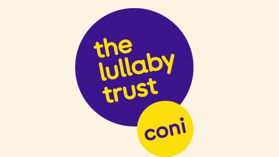 The Care of Next Infant (CONI) logo. Purple circle that says 'The Lullaby Trust' inside, with a smaller yellow circle below, overlapping that says 'CONI'.