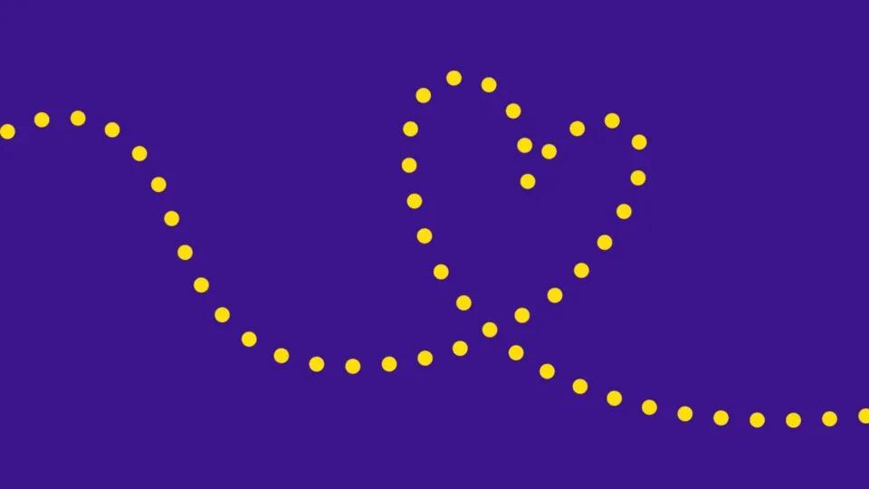Heart made out of yellow dots, on a purple background.