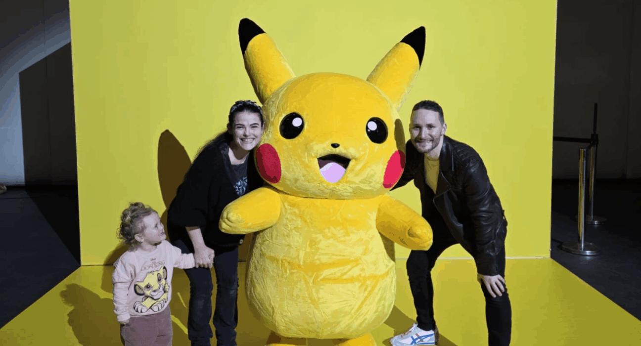 Helen, Gareth and Aerith posing with Pikachu.