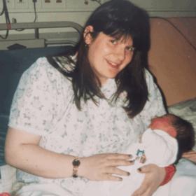 Christine with her daughter, Nerice, sitting up in bed.