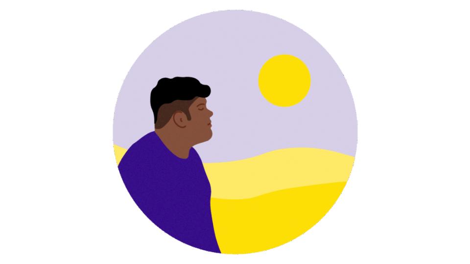 Person looking out towards the sun, looking hopeful