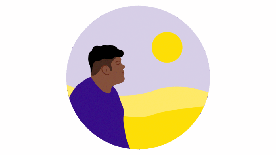 Person looking out towards the sun, looking hopeful