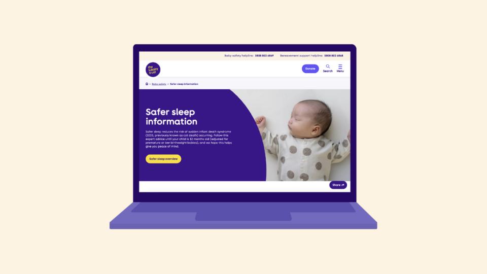 An open laptop with The Lullaby Trust's safer sleep advice on it.