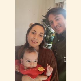 Layla, Patrick and Oscar smiling at the camera.