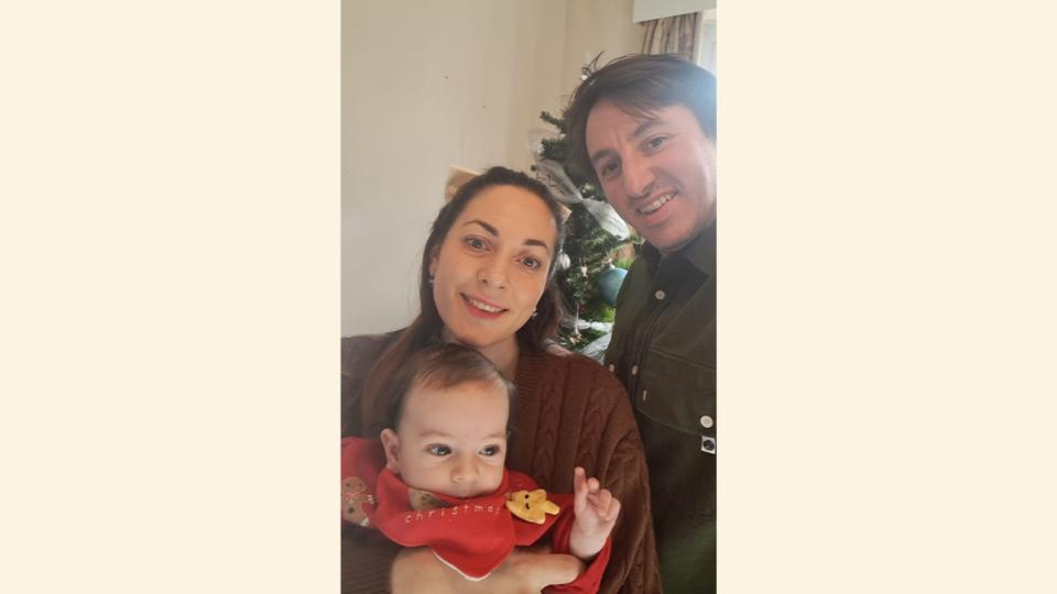 Layla, Patrick and Oscar smiling at the camera.