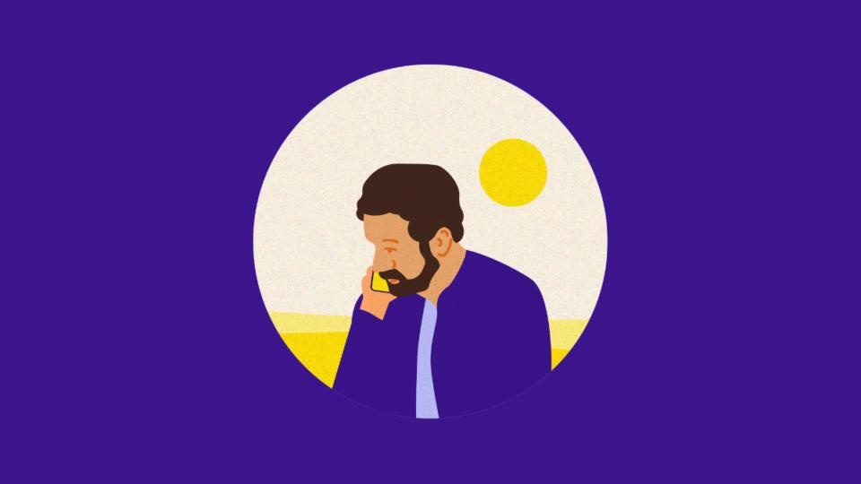 Man on the phone, with the sun behind him.