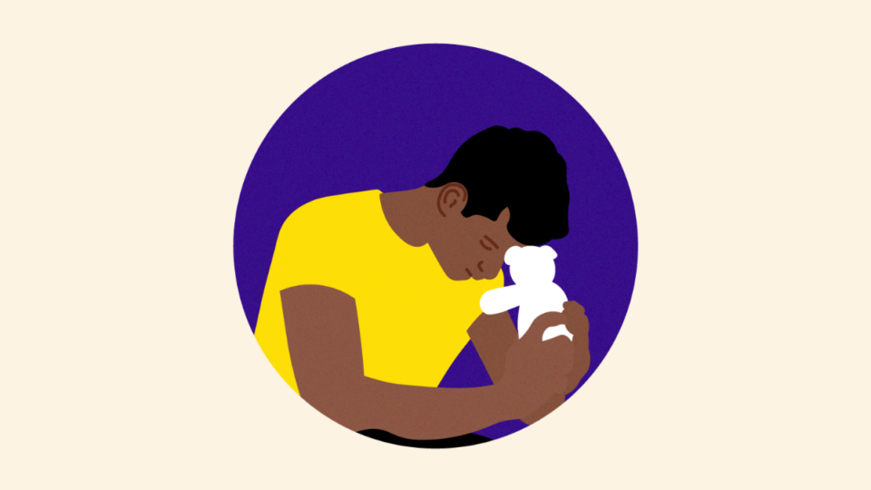 Illustration of man with his head down, holding a teddy.