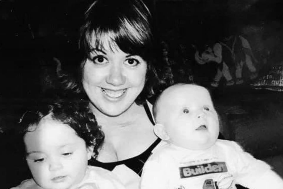 Kirsty with her two children in a black and white photo