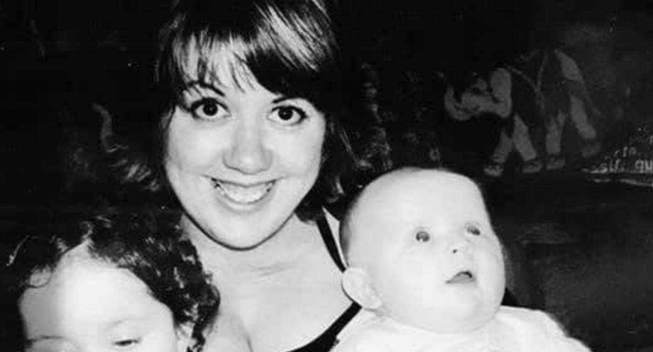 Kirsty with her two children in a black and white photo