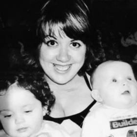 Kirsty with her two children in a black and white photo