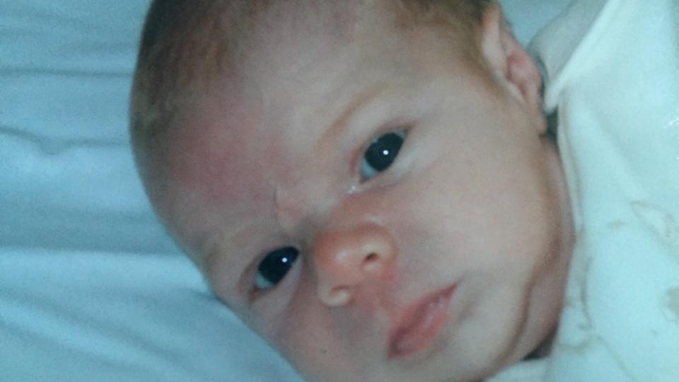A close up of baby Grant