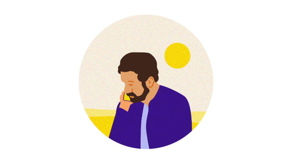 Hopeful man on the phone with the sun in the background