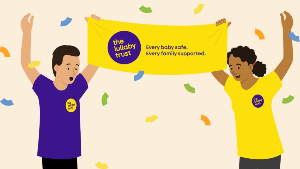 Illustration of two people wearing branded Lullaby Trust tops, holding up a banner and cheering. Confetti is falling.