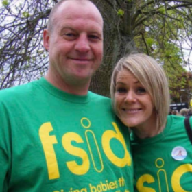 Sue and her husband wearing green FSID t-shirts