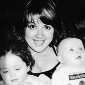 Kirsty with her two children in a black and white photo