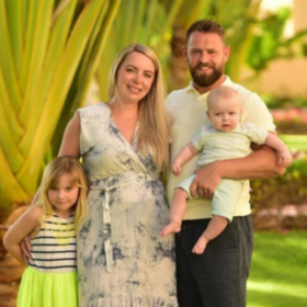 Family photo of Katie with her husband Christian, and their children Ellis and Theia.