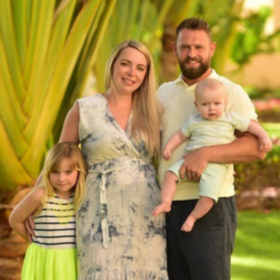 Family photo of Katie with her husband Christian, and their children Ellis and Theia.