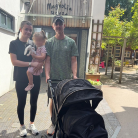 Ben, Meg and Cordelia outside Magnolia house with a privacy pram/