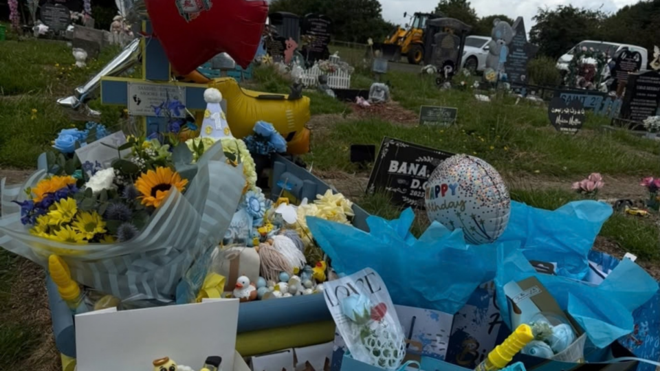 Samuel's grave on his birthday decorated with balloons and flowers