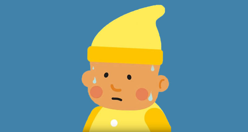 A baby is shown wearing a hat, their cheeks are flushing red and they are sweating due to being too warm